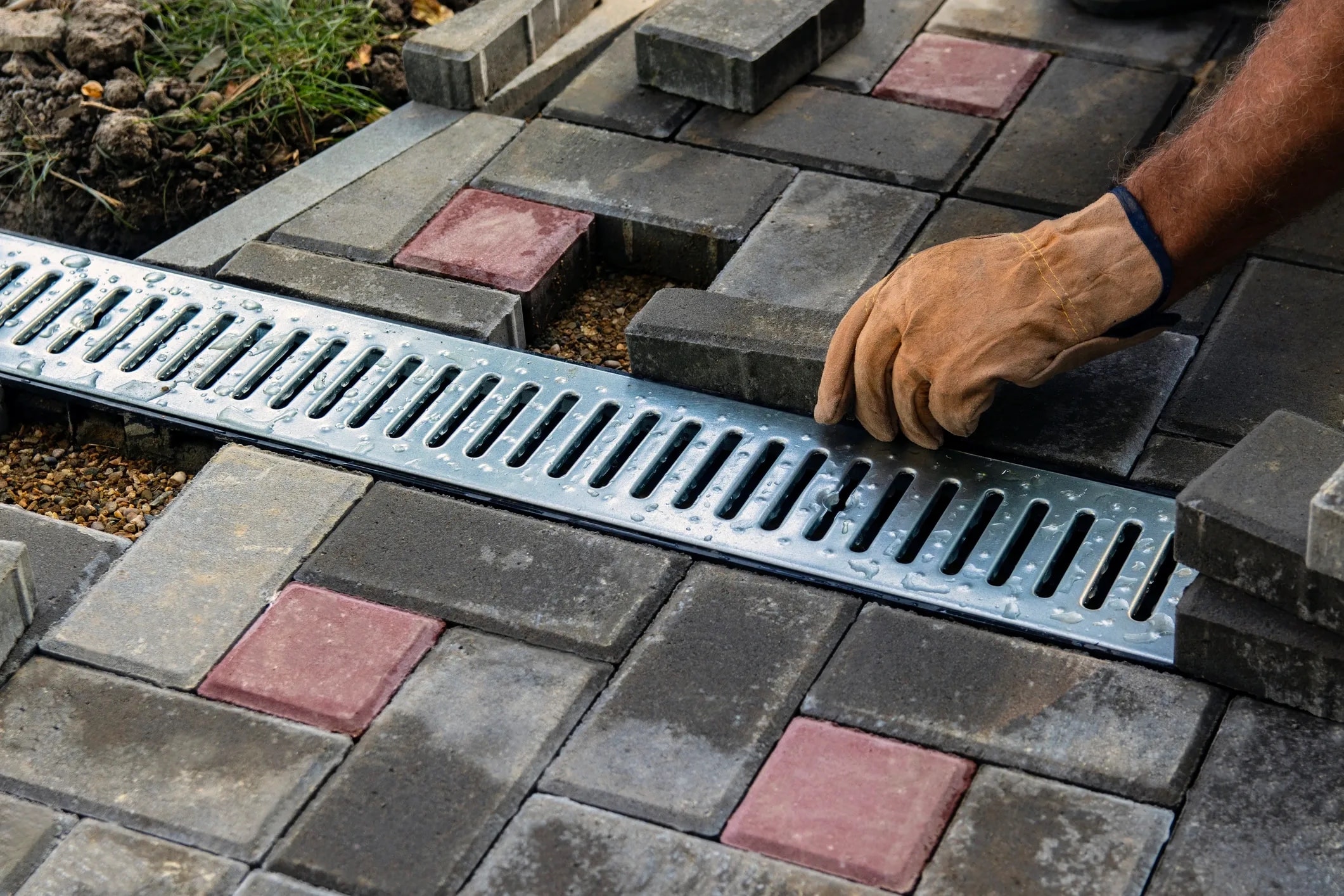 Channel drain linear trench drain installed in driveway or patio surface